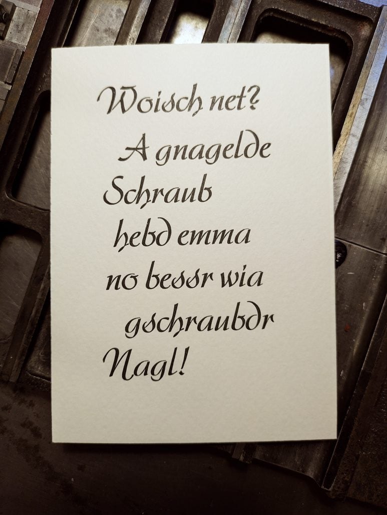 Handgeschriebene Notiz über eine Schraube mit humorvollem Text.